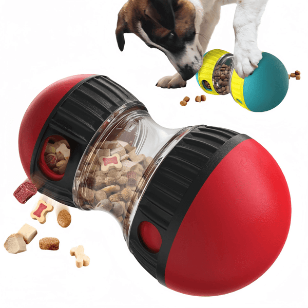 a red and black Treat Dispensing Dog Toy with snacks inside and  a dog playing with a blue and yellow  dispensing toy in the back 